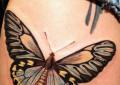 Butterflies tattoo on the leg of a girl: the value and photo